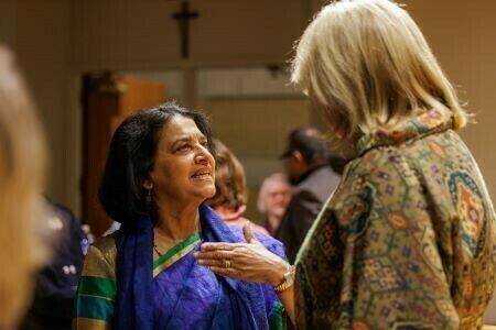 Geeta Anantandand offers her thoughts to former president of Ireland Mary McAleese after the talk.