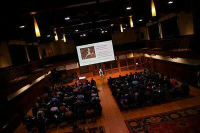 Celene Ibrahim giving a lecture at Harvard