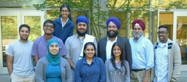 Professor Singh (second from right) poses with students and Professor Rahuldeep Singh Gill of California Lutheran University (CLU) following a panel help in 2014 called 1984 - Beyond the Trauma a which he moderated.